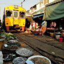 Seafood stall beside the railway track at the famous Railway market. See the train passing on our private railway market tour from Bangkok.