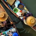 Local life at Tha Kha floating market. Visit this authentic market on our private floating market tour from Bangkok.