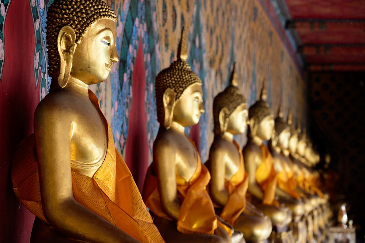 Buddha images around Wat Arun or the Temple of Dawn's ordination hall. Visit Wat Arun on our private tours in Bangkok.