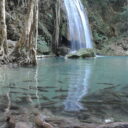 Waterfall and natural fish spa at Erawan National Park. This is the waterfall at level 3, there are 7 levels all together.