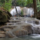 Waterfall at Erawan National Park in Kanchanaburi. Visit the impressive Erawan waterfalls on our private tour from Bangkok.