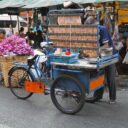 Local snack - grilled dried squids - at Bangkok's biggest flower market