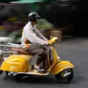 Scooter are also commonly found in Bangkok's biggest flower market