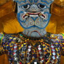 A demon supporting a stupa at Wat Phra Kaew 