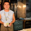 Shop owner at Khlong Toey Market