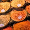 Dried shrimps of different sizes, tastes, and colors at the famous Railway market in Samut Songkram