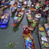 Vendors selling fresh produce from rowing boats at Tha Kha floating market