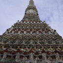 The 67 meter high stupa at Wat Arun, or the Temple of Dawn,  is decorated with pieces of Chinese porcelain