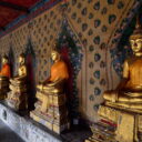 Buddha images around Wat Arun, the temple of dawn in Bangkok
